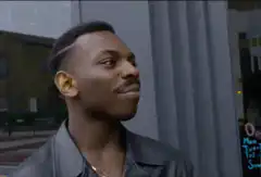 Man points to his head