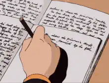 Hand writing in a notebook