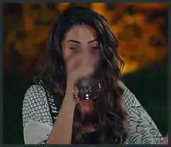 woman drinking wine and laughing