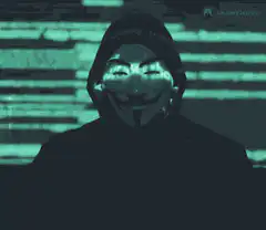 Anonymous hacker with code projection