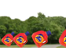 Tide bottles rolling down a hill