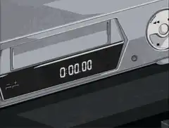Hand inserting cassette into player