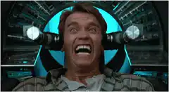 Arnold Schwarzenegger screaming in a machine