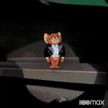 Tom in tuxedo bowing