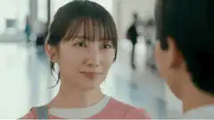 Couple kissing in a train station