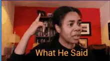 Woman pointing to head What He Said