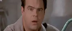 Man's eyes widen in shock
