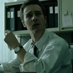 Edward Norton sweating in office