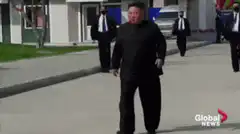 Kim Jong Un walking and bowing