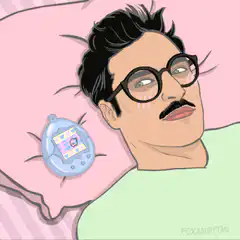 Satoshi Tajiri with Tamagotchi