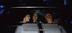 Three people in a car at night