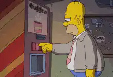 Homer Simpson shakes coffee vending machine