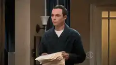Sheldon throws papers in the air