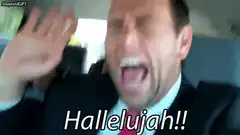 Man in car screaming Hallelujah