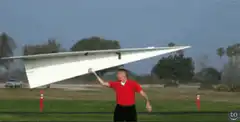 Man launches giant paper airplane
