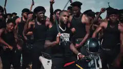 Kanye West on motorcycle with gang