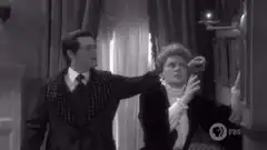 Downton Abbey man and woman look up in shock