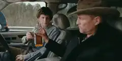 Dude and Stranger toast with whiskey