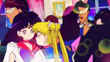 Sailor Moon and Sailor Mars hugging