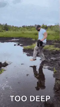 Man steps in mud and sinks