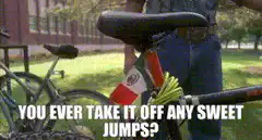 Guy with curly hair asks about bike jumps