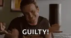 Michael Fassbender shrugging guilty