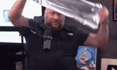 Alex Jones puts on a tinfoil hat