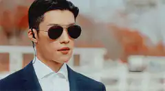 Man in sunglasses and suit