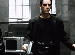 Neo draws dual pistols