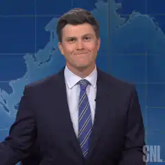 Colin Jost smirking at the camera