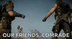 Two soldiers fist bump