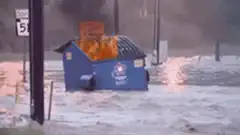 burning dumpster in snow