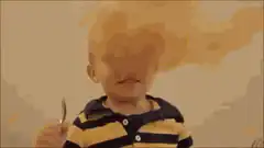 Toddler covered in spaghetti