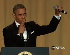 Obama waves microphone