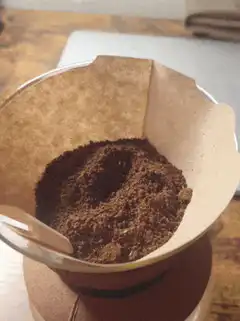 Coffee grounds in a paper filter
