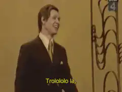 Man in suit laughing hysterically