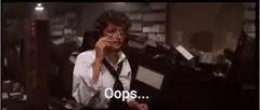 Woman says Oops while adjusting glasses