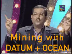 Man gesturing with Mining with DATUM + OCEAN text
