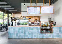 Modern cafe counter with blue tiles