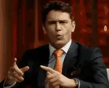 James Franco pointing fingers
