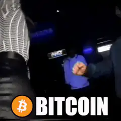 Man in MultiversX hat smiling with Bitcoin logo