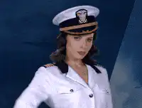 Woman in sailor uniform salutes and blows a kiss