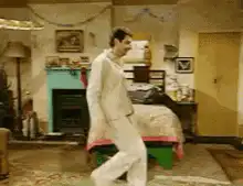 Mr. Bean dancing in his bedroom