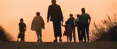 The Addams Family walking away at sunset