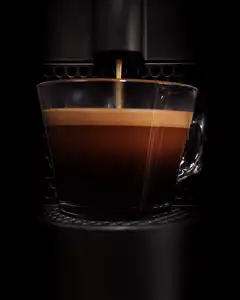 Coffee machine pouring espresso