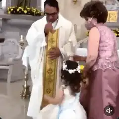 Girl slaps priest during baptism