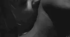black and white close up kiss