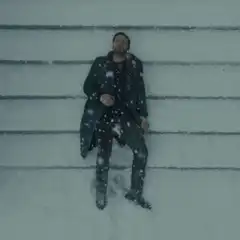 Man sitting in snow