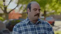 Ron Burgundy looks at his watch