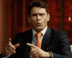 James Franco pointing fingers then shrugging